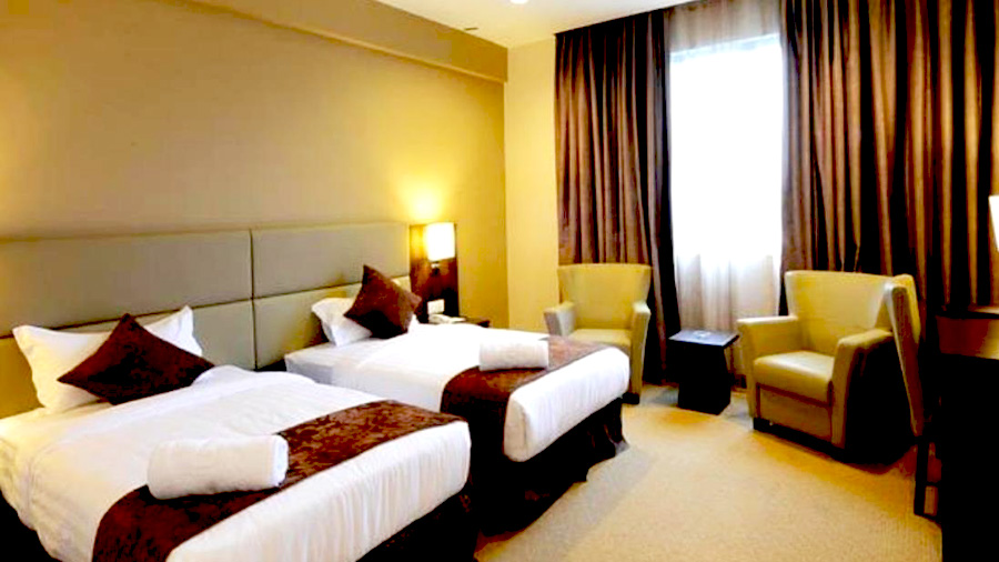 Lintas View Hotel - Bedroom